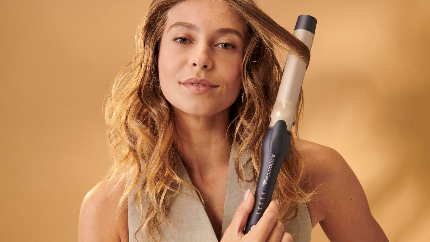 Sandy Brown Bio Ionic GoldPro 1.25" Curling Iron, Blue, Moisturising Heat & 24K Gold MX, New & Improved 12% Longer Barrel Ceramic Curling Iron, Adjustable Heat, Versatile Hair Styling Wand for Long-Lasting Curls